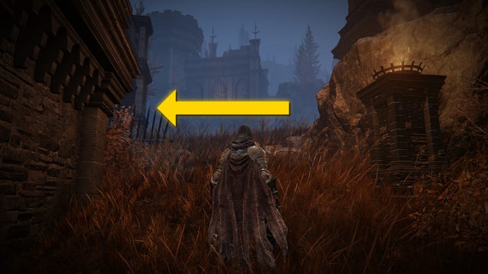 The player in Elden Ring: Shadow Of The Erdtree stands in a grassy path in Castle Ensis. A yellow arrow points in the direction of the location of the Milady weapon.