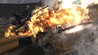 A driver is thrown from an exploding wrecked car in FlatOut Ultimate Carnage.